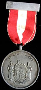 Daly College Medal. Silver, 47.7 g, 45 mm, with suspender and red ribbon. Obv. In centre t