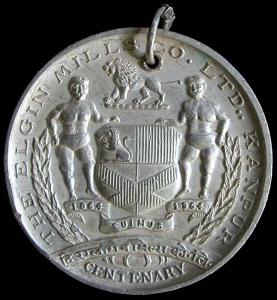 Elgin Mills Co. Medal. Silver, 58.5 g, 51 mm, with suspension. Obv. In centre the arms, a 