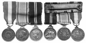 George 6 clasp with 3 miniatures medals $ ribbons silver