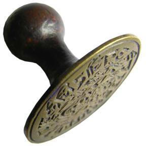 Seal of unjaud thana brass