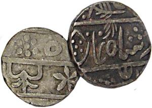 Lot of 7 Silver Coins: Rupee (4); ½ Rupee (2); and ¼ Rupee (1). Various varieties. Fine+ t