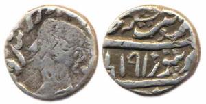 Silver ½ Rupee, portrait of Queen Victoria, VS 1910 / [1858] AD (KM 176.1). Has traces of 