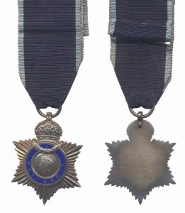 Rai Sahib Medal, George VI, Rai Sahib written on blue enamel in centre around the bust of 