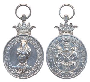 Cooch Behar, Accession Medal 1913, Silver, oval shaped medal surmounted by five pointed cr