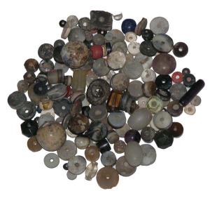 Collection of Primitive Bead Money (c. 1000-600 BC), Beads (165), the smallest bead in the