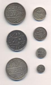 Arkat Mint, Silver (7), Rupee (3), including one of Surat, ¼ Rupee (2), and 1/8 Rupee (2).