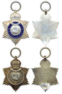 George V, pair of Indian Title Badges, Khan Sahib and Khan Bahadur, awarded to Mir Jurab A