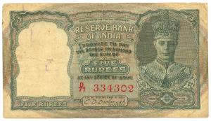 George VI, Rupees 5, 2nd issue, 1947, signed C. D. Deshmukh, serial number in red, (Jhun #