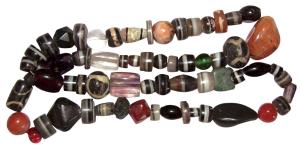 Primitive Money, (c. 100-300 BC) a necklace of beads strung during modern times. Possibly 