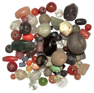 Primitive Money, (c. 100-300 BC) a large group of beads nicely carved out of agate, carnel