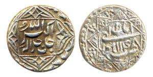 Akbar, Silver ½ Rupee, Lahore Mint, Ilahi 48, month Aban, ornamental style, (KM 67.1). Ver