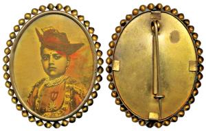Brass Badge, Madhav Rao Scindhia, with coloured portrait of the ruler. Very Fine+.