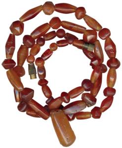 Ancient Beads, (c.100-1000 BC), probably used for jewellery. A newly strung necklace made 