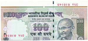 Rupees 100, Error, serial number printed upside down, note cut with substantial margin. Un