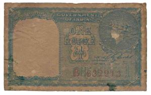 George VI, Rupee 1, signed C. E. Jones, serial number in red, (Jhun 1.1D). Toned, About Fi