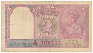 George VI, Rupees 2, 1944, signed C. D. Deshmukh, red serial number, (Jhun 2.3). Fine+.