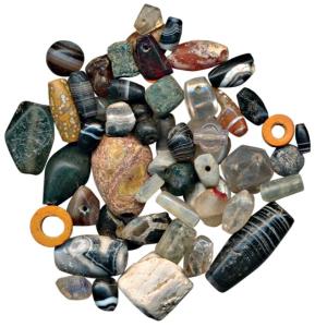 Beads, used for jewellery, a group of assorted beads of different stones, shapes, sizes an