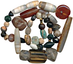Beads, used for jewellery, a newly strung attractive necklace made from beads of black jas