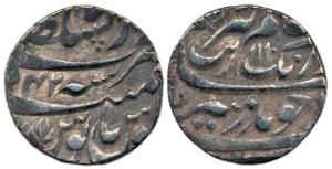 Aurangzeb, Silver Rupee, 11.0g, Lahore Mint, RY 42, a symbol in the seen of Manus. Very Fi