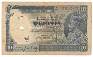 George V, Rupees 10, 3rd issue, 1933, signed J. W. Kelly, (Jhun 8.2). Fine+, Scarce.