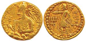 Kushanas, Huvishka, Gold Dinar, obv. king seated on clouds holding a mace in right hand an
