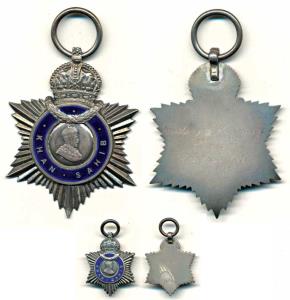 George V, Silver Indian Title Badge, Khan Sahib along with a miniature, awarded to Rustomj