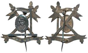 Nawanagar, Silver Cap Badge, portrait of Jam Vibhaji in centre with three flags on a stand