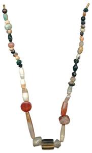 Beads, used for jewellery, a newly strung attractive necklace made from beads of black jas