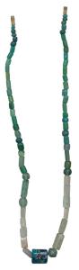 Beads, used for jewellery, a newly strung attractive necklace made from beads of green sto