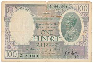 George V, Rupees 100, Lahore, 1927, signed J. W. Kelly, (J&R 10.3E). Tear in the middle at