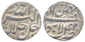 Akbar, Silver Rupee, Lahore Mint, Ilahi type, Month Bahman, Year 42. Broad flan, Very Fine