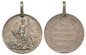 Mysore Medal, Silver, a Sepoy of the EIC Army, holding British and Company flags over a tr