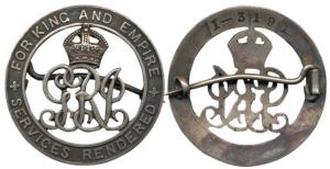 Silver War Badge, a broach mounted circular badge with the crowned royal monogram in the c