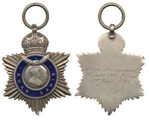 Indian Title Badge, George V, Silver, Khan Sahib, awarded to Mirza Muhammad Hussain Khan o