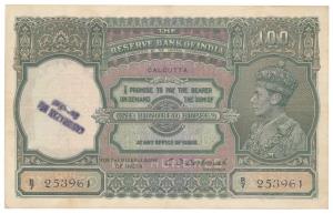 George VI, Rupees 100, 1944, Calcutta, signed C. D. Deshmukh (J&R 7.2D). Stamp on the wate