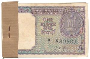 Rupee 1 Bundle, 1963, signed L. K. Jha, (J&R 1.5.1). Rusted pin, otherwise About Uncircula
