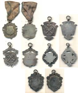 Privately engraved sports and good luck Medals (5) Total wt. 48g. Extremely Fine. (5)