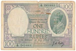 George V, Rupees 100, Lahore, 1927, signed J. W. Kelly, (J&R 10.3E). Tear in the middle at