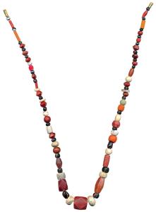 Ancient Beads, probably used for jewellery, a newly strung necklace made from beads of car