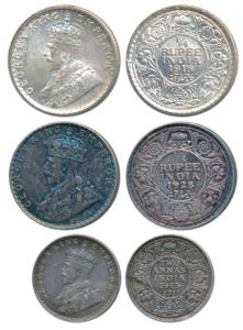George V, Silver ¼ Rupee (2), 1918 and 1928; 2 Annas 1915. Extremely Fine to Uncirculated.