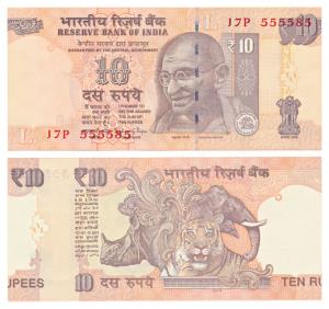 Rupees 10, signed Raghuram Rajan, Error, note cut incorrectly, with extra paper of another