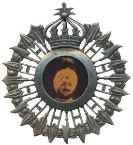 Patiala, King Bhupinder Singh, Silver Badge, a sepia photo of the ruler wearing the famous