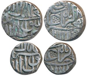 Akbar, Silver Mahmudi and ½, Mulher Mint, both with a flag / dhwaja like symbol on rev, AH