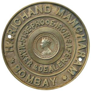 Plaque containing a cast copy of Queen Victoria's Calcutta Exhibition Medal in centre, Har