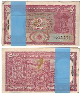 Rupees 2 bundle, signed I. G. Patel, (Jhun 6.2.8.3c). Extremely Fine.