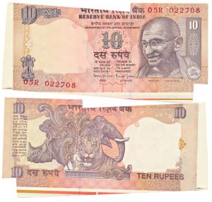 Rupees 10, signed Bimal Jalan, Error, unevenly cut with extra margins. Uncirculated.