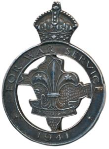 Boy Scouts of India, Silver Badge, 10.95g, For War Service, 1941 written around the map of