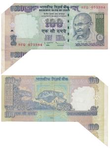 Rupees 100, 2009, signed D. Subbarao, Error, margin with extra paper at the left and part 