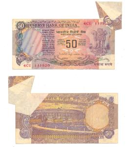 Rupees 50, signed Manmohan Singh, Error, with a white patch on the rev., extra paper folde