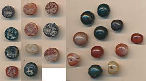 Modern, an assorted lot of Beads, all etched with different figurines in negative, of diff